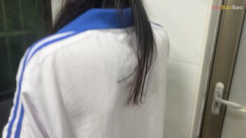 Sexbaobao is a student and her roommate catches her in the action while on the phone.