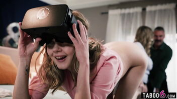 Youthful stepdaughter enjoys virtual reality experience endowed by her step parents