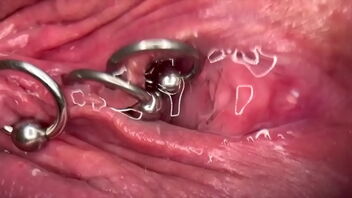 Witness how a nymph with pierced pussy gets raw and even urinates in this fetish video.