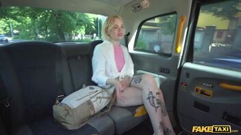 A blonde gets a harsh and quick plumb in a fake taxi.